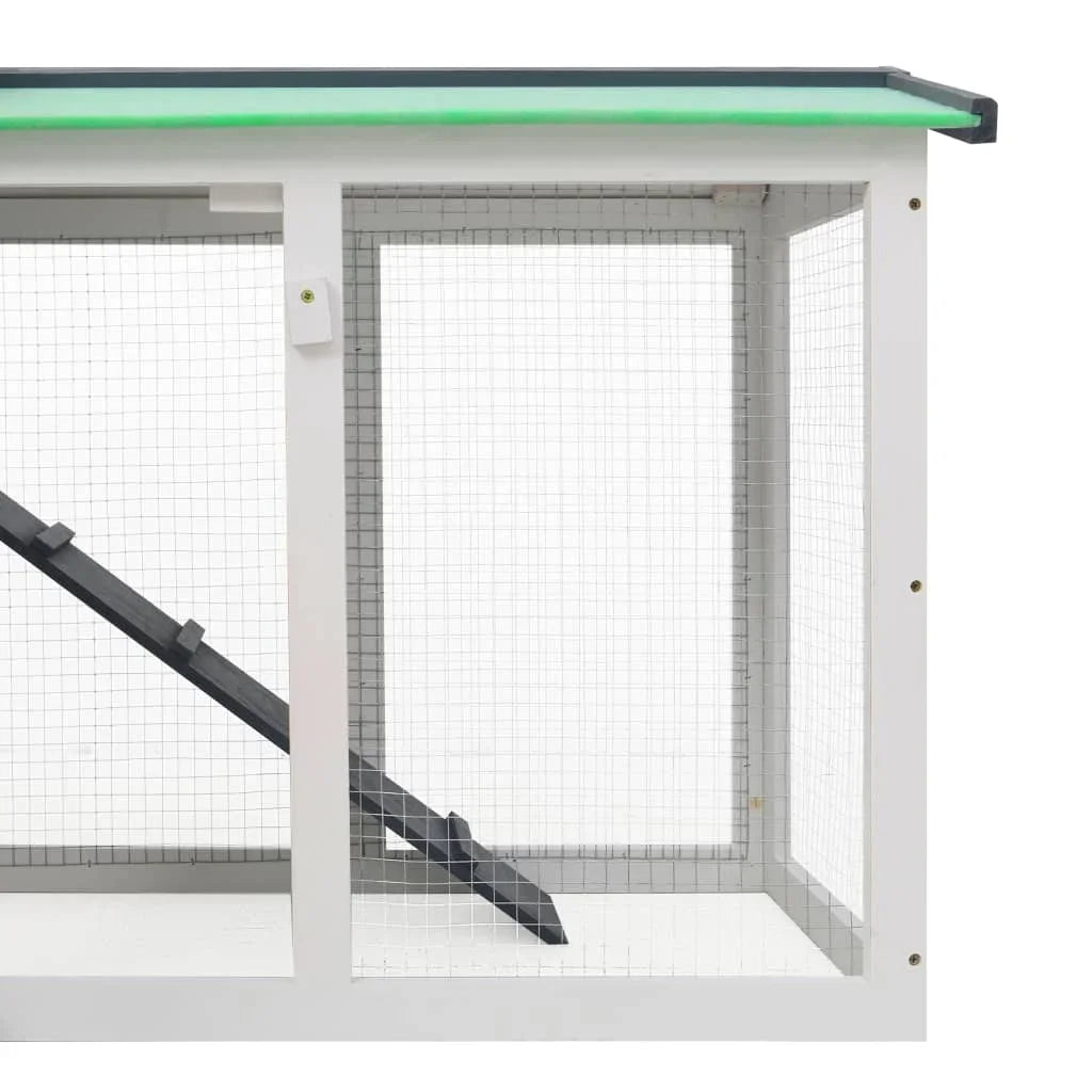 Maison en bois double niveau - La cage à Lapin